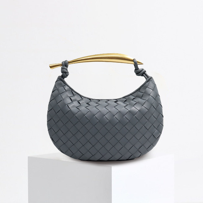 L'AUBRIELLE INTRICATE LEATHER HANDBAG