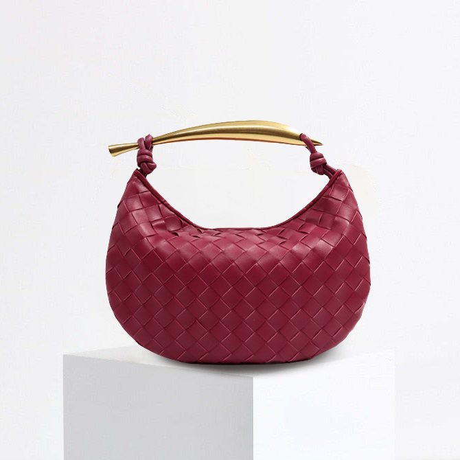 L'AUBRIELLE INTRICATE LEATHER HANDBAG