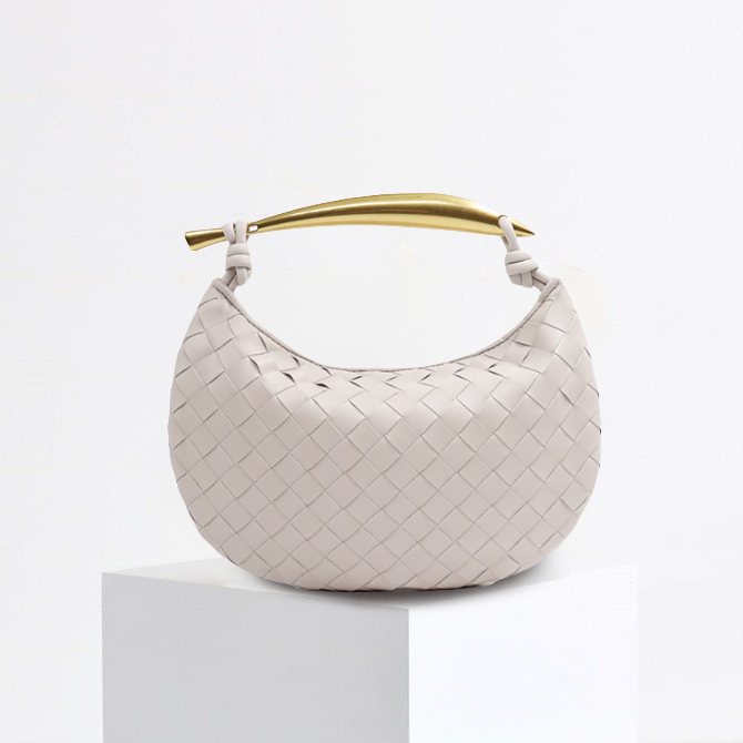 L'AUBRIELLE INTRICATE LEATHER HANDBAG