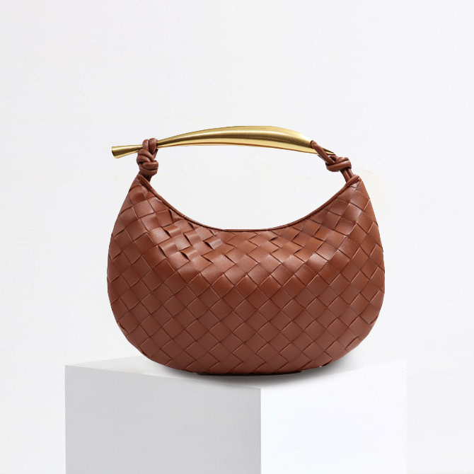 L'AUBRIELLE INTRICATE LEATHER HANDBAG